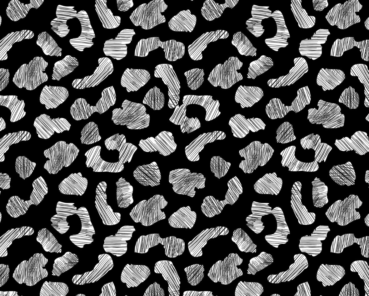 Image d’un motif léopard stylisé en noir et blanc, parfait pour des accessoires tendance.