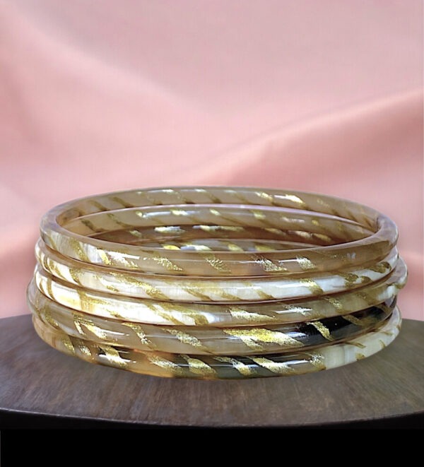 Bracelet corne zebre 4mm dore
